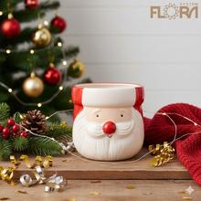 Vianočný obal s Mikulášom, keramický kvetináč.