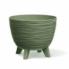 Zelená misa na nohách s textúrou.