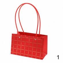 Široká taška na kvety s mixom vzorov.