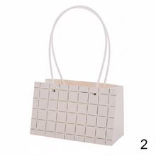 Široká taška na kvety s mixom vzorov.