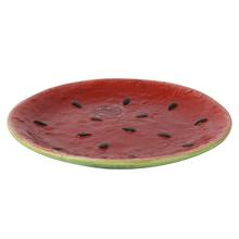 Tanier dolomitového melónu lesklý melón s čiernymi semienkami.