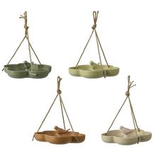 Kŕmidlo pre vtáky z bambusu v štyroch farbách.