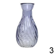 Priehľadná sklenená váza v štyroch farbách.