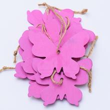 Ružové motýle z dreva na aranžovanie.