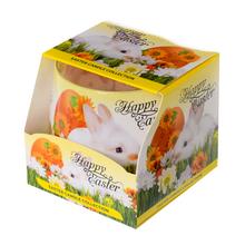 Veľkonočná sviečka v skle s motívom zajaca.