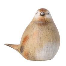 Keramický vták s prírodným vzhľadom.