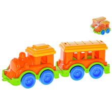 Oranžový vlak s vagónom, 19 cm dlhý.