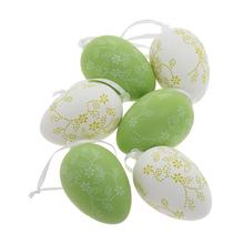 Sada plastových vajíčok v zeleno-bielej farbe na zavesenie.