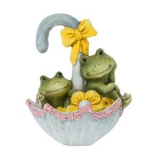 Žaby v dáždniku so slnečným osvetlením.