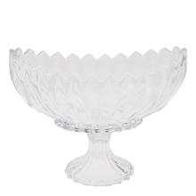 Sklenená misa na podstavci s vlnitým okrajom.