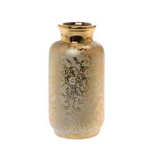 Zlatá keramická váza na suché aranžovanie.