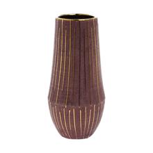 Okrúhly obal burgundskej farby so zlatými pruhmi.