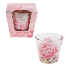 Sviečka v skle s vôňou pivoniek v ružovom odtieni.