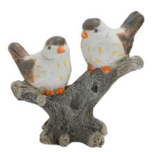 Keramické vtáčiky na konári