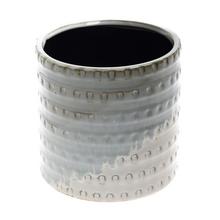 Trojfarebný keramický obal v šedej farbe.