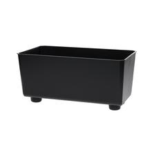 Čierny hrantík na nožičkách