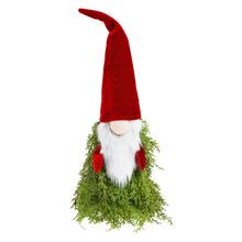 Vianočný škriatok s červenou čiapkou a zeleným telom.