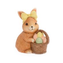 Keramický zajačik s košíkom a vajíčkami.