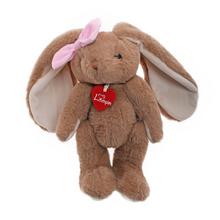 Plyšový králik Lotty s ružovou mašľou.