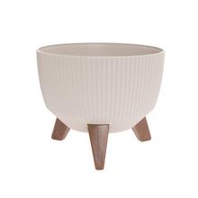 Béžový kvetináč na nožičkách