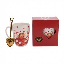 Šálka s čajítkom s motívom anjela a srdiečok.