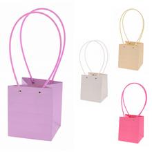 Taška na kvety v mix farbách s dlhými rúčkami.