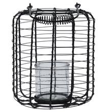 Kovový lampáš so sklenenou nádobou.