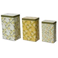 Sada troch plechových boxov s kvetinovým vzorom.