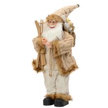 Vianočný Santa Claus s batohom a lyžami.
